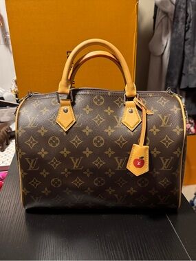 Gorgeous monogram satchel with silver hardware and vibrant yellow interior!